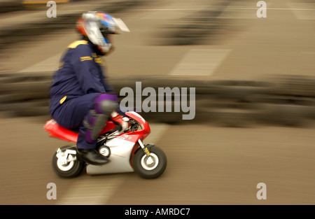 Motocross racing. 15yr+ division race. Grown ups ride small 50cc