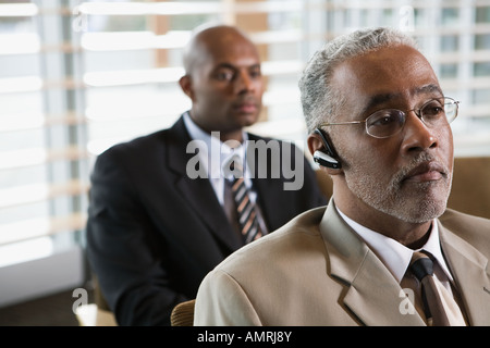 African businessmen in waiting area Stock Photo