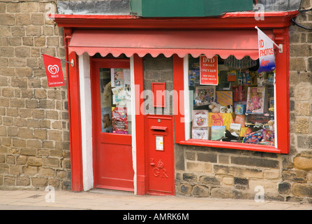 Old Post Office with red Georgian postbox and shop. Pateley Bridge North Yorkshire England UK Britain Stock Photo