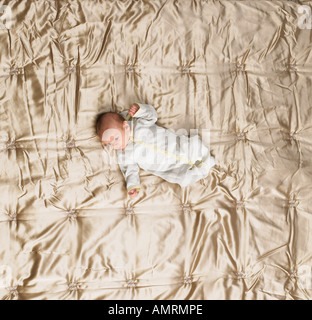 Newborn Baby On Bed Stock Photo
