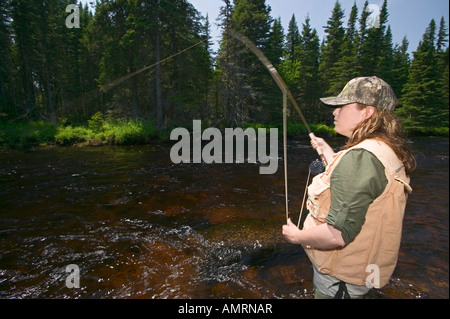 Canada, Newfoundland, Northern Peninsula, Viking Trail, Tuckamore Lodge, young lady fishing, Amanda Stock Photo