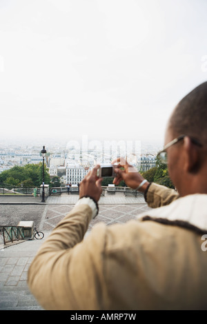 African man photographing city view Stock Photo