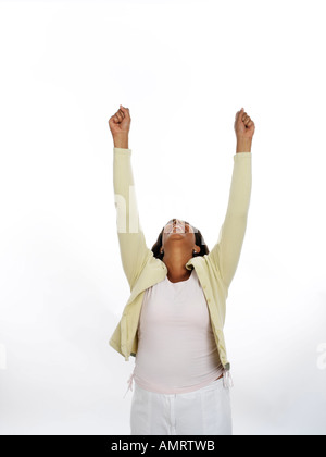 Woman with Arms Up in Air Stock Photo