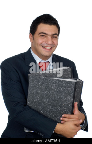 Happy employee holding binders Stock Photo