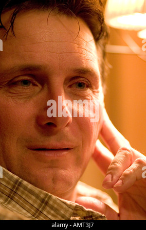Handsome man age 45 deep in thought. Plainfield Illinois IL USA Stock Photo