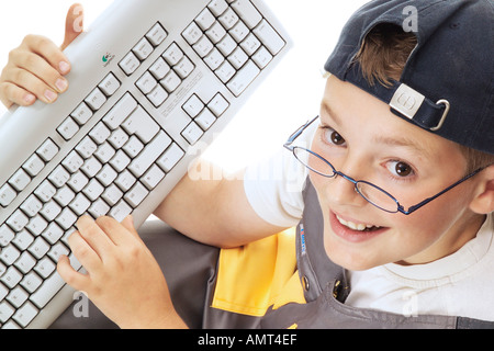 Boy using keyboard Stock Photo