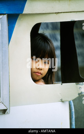 Philippines Young Girl Looking Out Bus Window
