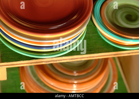 rustic plates in a cupboard Stock Photo