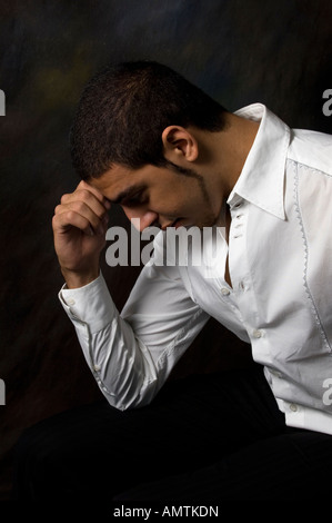 Upset man in the dark Stock Photo