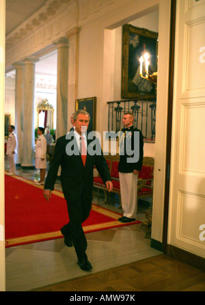 President George W Bush walks into a ceremony of Pacific American Heritage month in the East Room of the White House Stock Photo