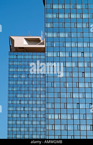 Office Tower Exteriors with Mirrored Glass Windows Stock Photo