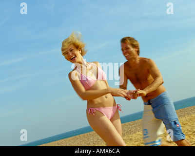 Couple Having Fun on Beach Stock Photo