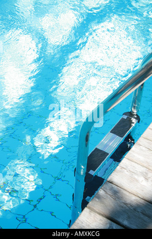 High angle view of ladder in swimming pool Stock Photo