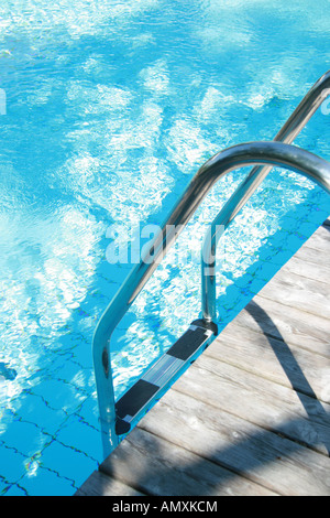 High angle view of ladder in swimming pool Stock Photo