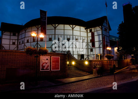 Theater lit up at night, Globe Theatre, London, England Stock Photo