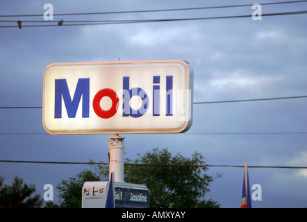 An illuminated advertisement of Mobil Stock Photo