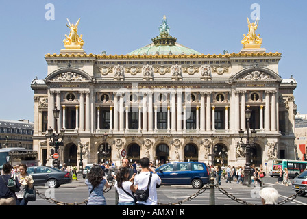 Tourists in front of opera house Palais Garnier Paris France Stock Photo