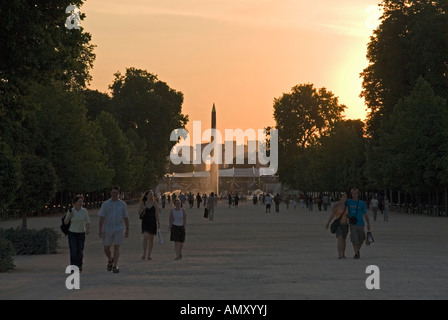 Tourists in front of obelisk column Stock Photo