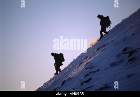 Climbers make their way home in the evening on the Black Mountains, Powys, Wales, UK. Stock Photo