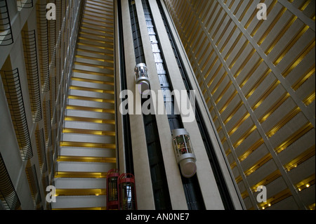 Elevator pods inside the New York Marriott Marquis hotel on Times Square in New York City USA May 2005 Stock Photo