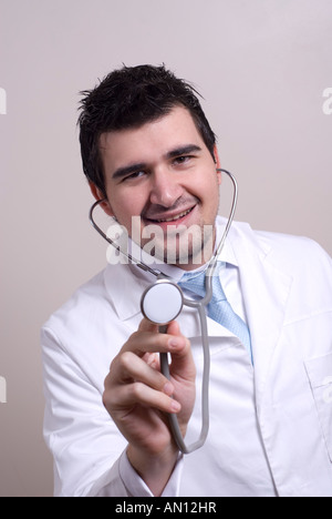 Smiling doctor with a stethoscope Stock Photo