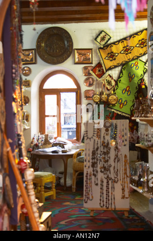 Various wares at a stall shop at the Marketplace at the Mayan Ruins of ...