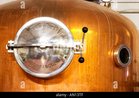 A distillation machine still in stainless steel and copper with narrow column. Marked Arnold Holstein Markdorg, Bodensee.. Hercegovina Produkt winery, Citluk, near Mostar. Federation Bosne i Hercegovine. Bosnia Herzegovina, Europe. Stock Photo