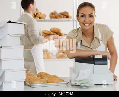 Portrait of Hispanic female bakery worker Stock Photo
