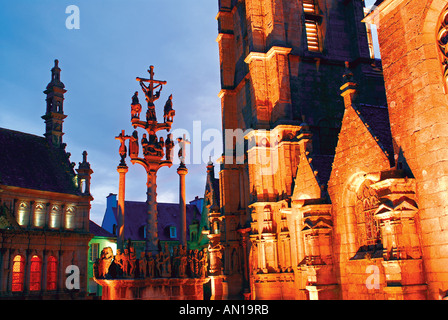 Calvaire and enclosed Church of St. Thegonnec  by night,   St. Thegonnec, Brittany, France Stock Photo