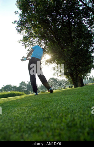 Golf Golfing Golfsport, close-up of a golf player hitting his ball Stock Photo