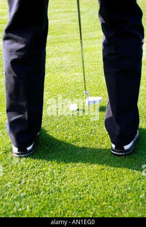Golf Golfing Golfsport, close-up of a golf player hitting his ball at first hole Stock Photo