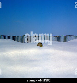 snow drift with fence Bavaria Germany Europe. Photo by Willy Matheisl Stock Photo