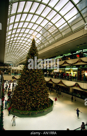 USA Texas Houston Galleria Shopping Mall Interior skating round Christmas tree Stock Photo