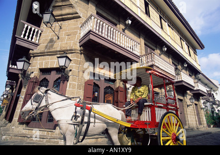 Philippines, Manila, Calesa (Horse-drawn Carriage) & Colonial Building, Intramuros Historical District Stock Photo