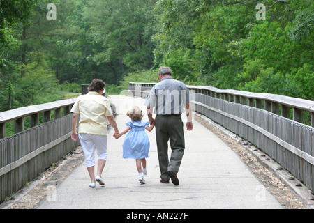 Louisiana Abita Springs,Tammany Trace,rail to trail conversion,family families parent parents child children,mother mom,father dad,walking,exercising, Stock Photo