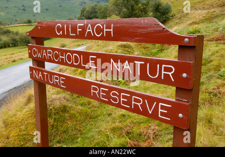 Bilingual English Welsh language sign Gilfach Nature Reserve Site of Special Scientific Interest nr Rhayader Powys Mid Wales UK Stock Photo