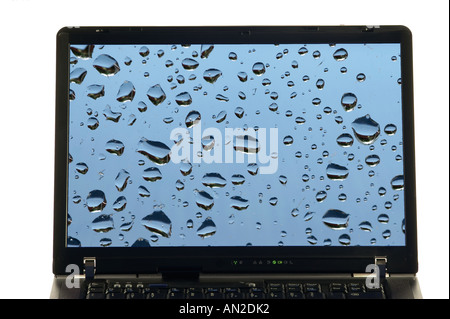Laptop isolated on white with raindrops on screen Stock Photo