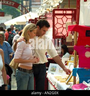 Couple in Piazza, Apple Market Stock Photo