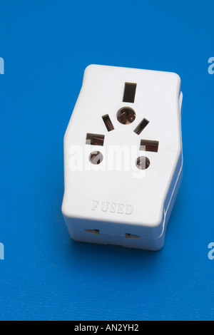 traveller's adaptor plug that can be used for european and american power plugs Stock Photo