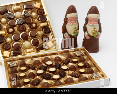 Christmas Chocolates Father Christmas Figures and Boxes of Chocolates Stock Photo