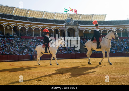 Horseback officials or alguacilillos heading the paseillo or initial parade. Stock Photo