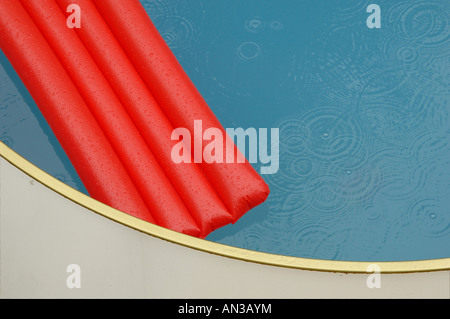 airbed in a pool Stock Photo