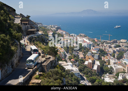 Gibraltar Tourist buses at the Apes Den Morocco in background Stock Photo