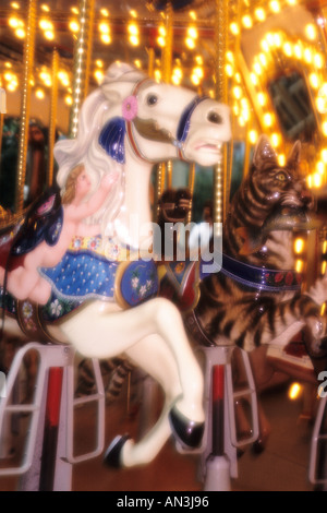 Close up of Carousel horse on merry go round in amusement park Stock Photo