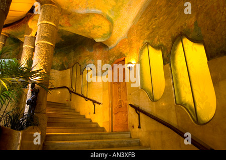 Ornate staircase inside courtyard of La Pedrera apartment block designed by Catalan architect Antoni Gaudí Barcelona Spain Stock Photo