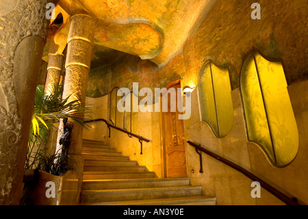 Ornate staircase inside courtyard of La Pedrera apartment block designed by Catalan architect Antoni Gaudí Barcelona Spain Stock Photo