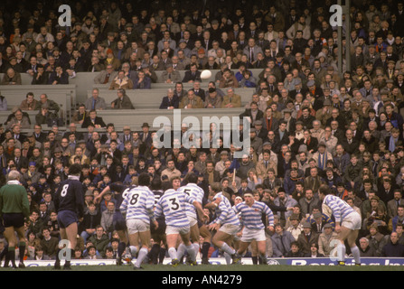 Varsity Rugby match at Twickenham Oxford university v Cambridge University. Oxford in the light blue. Crowd people Lin stands 1985 1980s HOMER SYKES Stock Photo