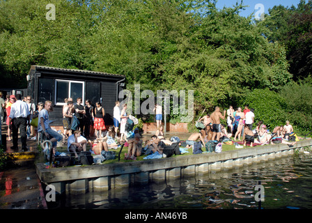 Swimmers at the Mixed Bathing Pond on Hampstead Heath London Stock ...