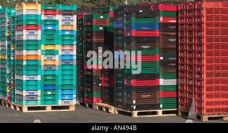 Inventory Piles of empty plastic transport boxes , used to transport bread and bakery products , Finland Stock Photo
