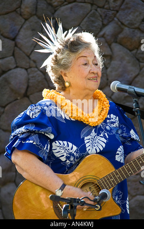 Hawaiian elder woman sings traditional songs Waikiki Hawaii Stock Photo